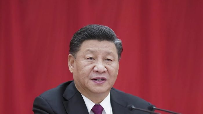 Xi